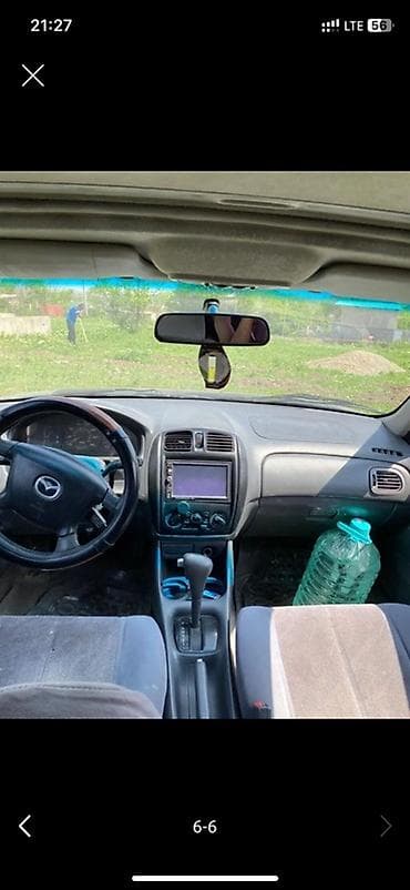 Продажа авто: Mazda 323: 2001 г., 2 л, Автомат, Седан — 4