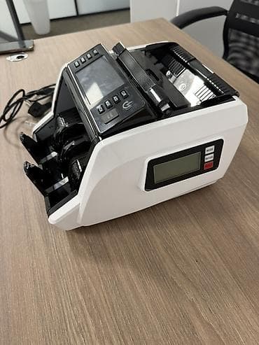 Соода жабдуулары: Счетчик банкнот модели ACL-810A в бело-черном корпусе. Устройство — 2
