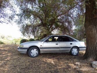 мазда 122: Mazda 626: 1990 г., 2 л, Механика, Бензин, Хетчбек — 4