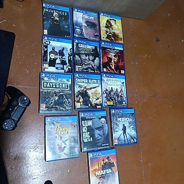 мото зарядка: PlayStation 4 Pro (черная) + 2 геймпада DualShock 4 + набор дисков ИЛИ — 4