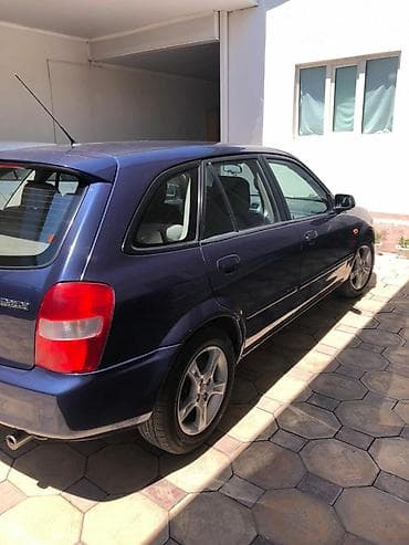 launch pro elite: Mazda 323: 2002 г., 1.6 л, Механика, Бензин, Хэтчбэк — 3