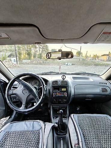 1: Mazda 323: 1998 г., 1.5 л, Ручные, Бензин, Седан — 7