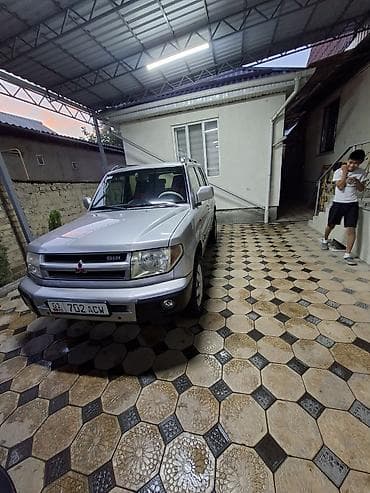 горный: Mitsubishi Pajero iO: 2001 г., 2 л, Автомат, Бензин, Внедорожник — 10