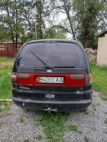 запчасть для авто: Ford Galaxy, черный минивэн, 5-дверный кузов. Автомобиль без передних — 3