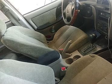 bmw e36 coupe: Hyundai Elantra: 2001 г. — 4