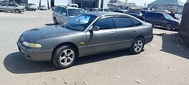 мтз 92: Mazda 626: 1992 г., 2 л, Механика, Бензин, Хэтчбэк — 4