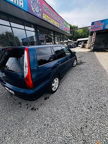 Транспорт: Mitsubishi Lancer: 2004 г., 1.6 л, Типтроник, Бензин, Универсал — 2