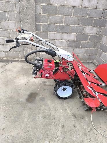 дом на колесо: Компактный мотоблок‑жатка для уборки зерновых и технических культур — 1