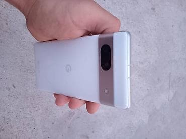 Google: Google Pixel 7a, Б/у, 128 ГБ, цвет - Белый, 1 SIM, eSIM — 2
