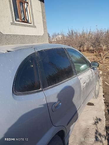Nissan Tino: 2002 г., 2.2 л, Механика, Дизель, Хэтчбэк — 9