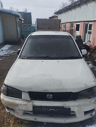 фары киа к5: Mazda Familia: 2002 г., Бензин, Универсал — 1