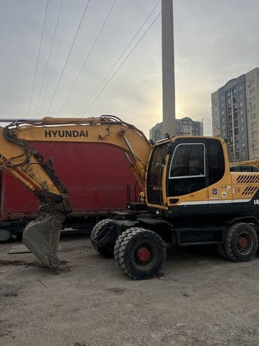 колесные диски опель фронтера: Экскаватор, Hyundai, 2013 г., Колесный — 3