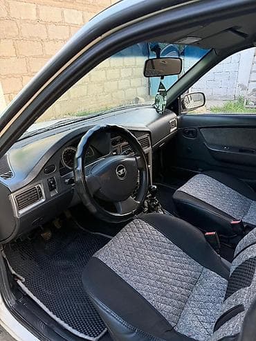 Унаа: Daewoo Nexia: 2010 г., 1.6 л, Кол менен иштөөчү, Бензин, Седан — 4