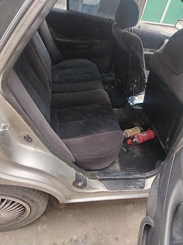 mat: Mazda Familia: 1999 г., 1.5 л, Автомат, Лимузин — 5