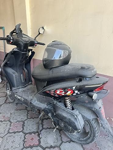 мото скупка: Скутер KYMCO, черный цвет, городской класс. Основное: - Бензиновый — 1