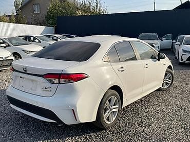 gl: Toyota Corolla: 2021 г., 1.8 л, Вариатор, Гибрид, Седан — 2