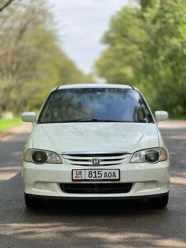 скутер мопед цена: Honda Odyssey: 2001 г., 2.3 л, Автомат, Газ, Универсал — 4