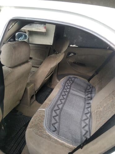 купить диски штампованные r15: Daewoo Nubira: 1999 г., 1.6 л, Механика, Бензиновая — 1