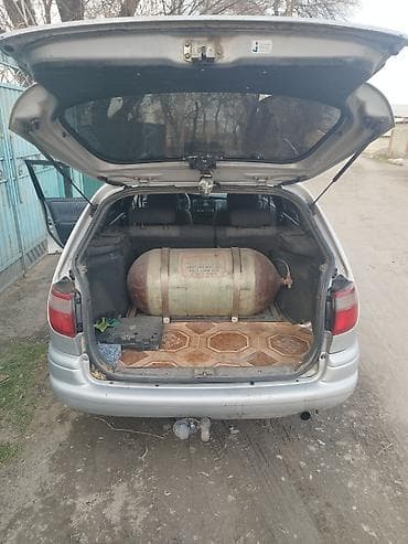 диски на тико: Toyota Carina E: 1997 г., 1.8 л, Газ, Универсал — 9