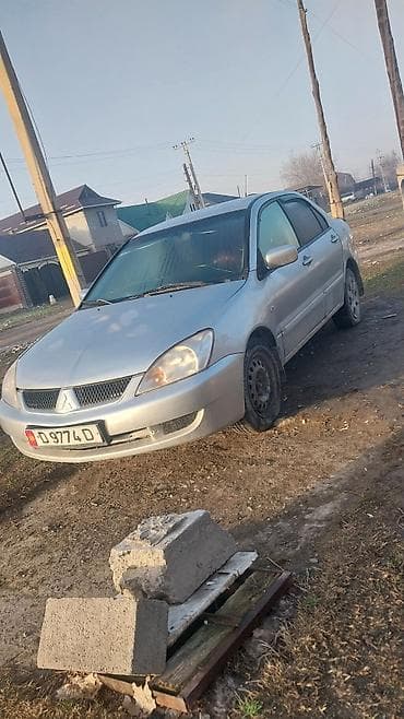 4 вд: Mitsubishi Lancer: 2006 г., 1.6 л, Автомат, Седан — 5