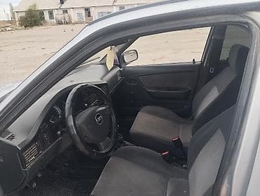 дэу матиз 1: Daewoo Nexia: 2011 г., 1.5 л, Кол менен иштөөчү, Бензин, Седан — 8