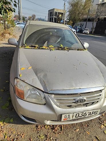 чехли: Kia Cerato: 2007 г., 1.6 л, Автомат, Бензин, Седан — 1