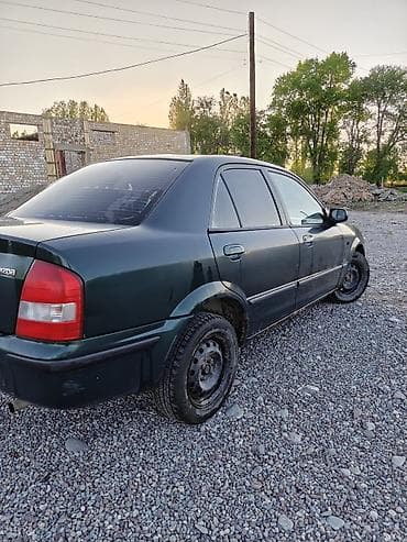 1: Mazda 323: 1998 г., 1.5 л, Ручные, Бензин, Седан — 6