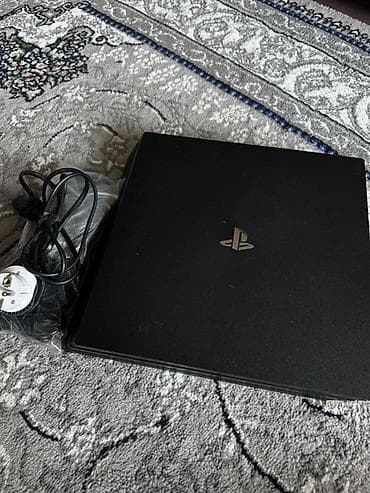PS4 (Sony PlayStation 4): PlayStation 4 pro (черная) — комплект для игр на всю семью. В — 1