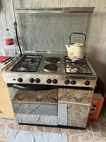 Комбинированная плита, Indesit, Б/у, Напольная, Механическая, Полная оплата