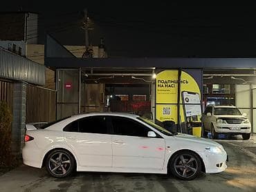 mazda 3: Mazda 6: 2003 г., Лифтбек — 4