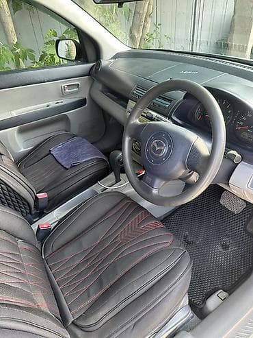 пл: Mazda Demio: 2004 г., 1.5 л, Автомат, Бензин, Универсал — 6