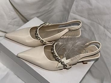 Угги: Элегантные женские туфли-сланги с открытой пяткой и острым носком. - — 3