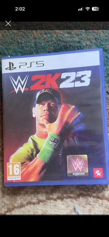 WWE 2K23 — версия для PlayStation 5 (диск, коробка Blu‑ray). -