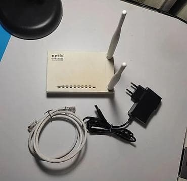 Модемы и сетевое оборудование: Wi-Fi роутер Netis WF2419E (N300, 1xFE WAN, 4xFE LAN, 2 антенны) — 1