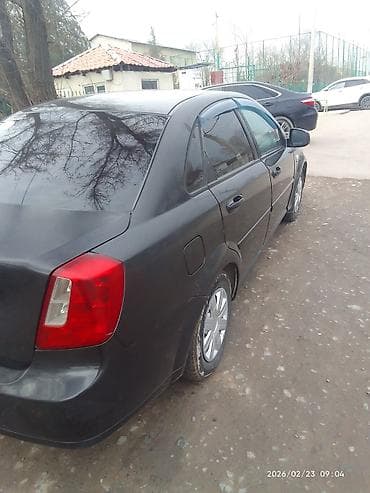 кио к5: Daewoo Gentra: 2013 г., 1.5 л, Механика, Газ, Седан — 3