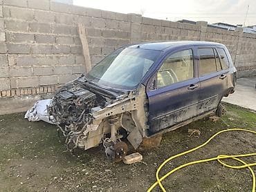 запчасти на опель зафира б: Разбор на запчасти: Mazda Demio 2003, 2-Поколение, цвет темно‑синий — 1