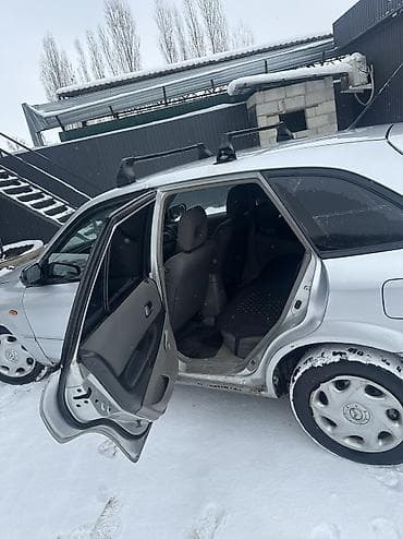мазда примоси: Mazda 323: 2002 г., 1.3 л, Бензин, Хэтчбэк — 4