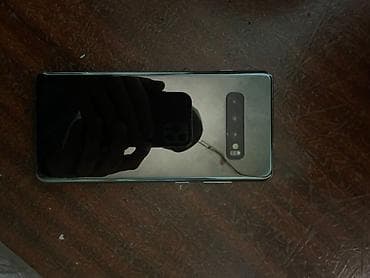 4k 2k: Samsung Galaxy S10 Plus, цвет - Серебристый, 2 SIM — 1