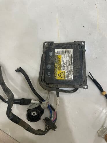 GPS трекерлер: Блок ксенона б/у на дальний свет в оригинале Lexus LX 570 — 1