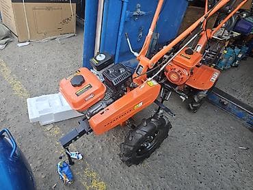 мотокоса бензиновая: Мотоблок бензиновый, оранжевый, колёсный Описание: - Бензиновый — 4