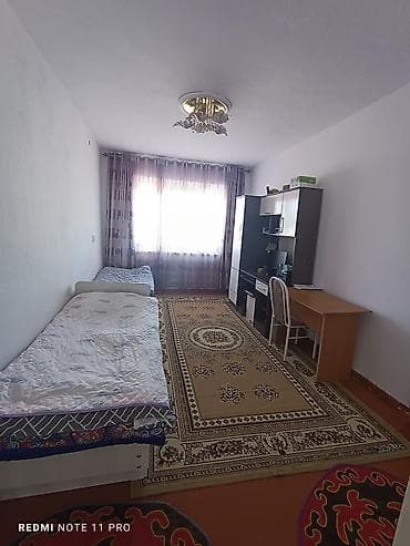 туз село: Большой дом по ул. Тельмана (Карасаева, 30). - Планировка: 4 комнаты — 9