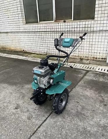 мотоблок бензиновый: Мотоблок бензиновый, колесный бирюзового цвета — 1