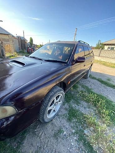 byd e3: Subaru Legacy Lancaster: 1995 г., 2 л, Автомат, Универсал — 6