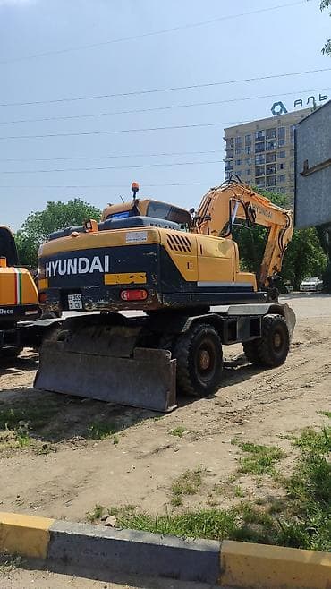 экскаваторы 140: Экскаватор, Hyundai, 2010 г., Колесный — 3