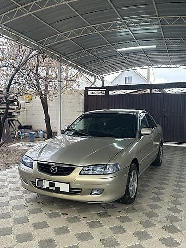 бампер mazda demio: Mazda 626: 2000 г., 2 л, Механика, Бензин, Седан — 4