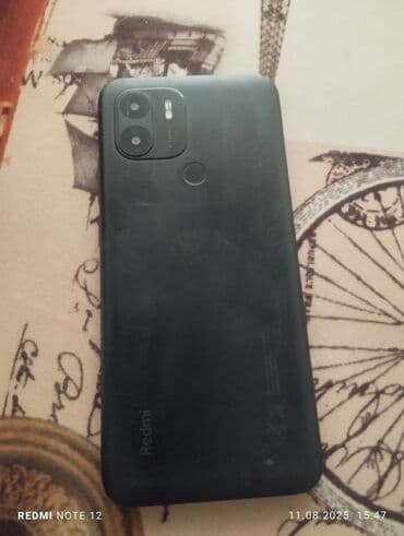 lcd мониторы: Смартфон Redmi Note12 черного цвета с матовой текстурой задней панели — 1