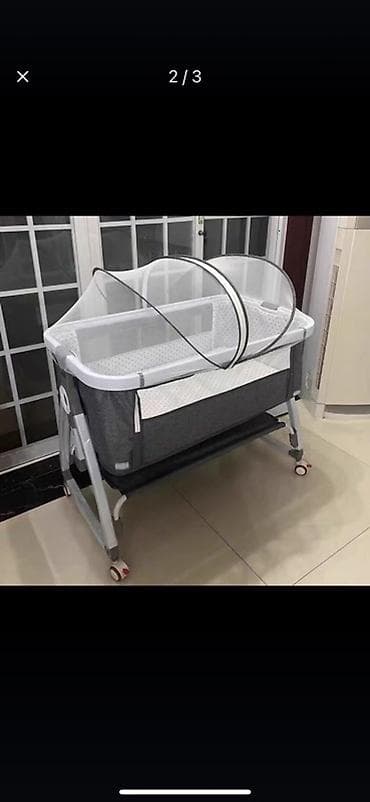 Детская колыбель-люлька на колесиках с москитной сеткой - Просторная