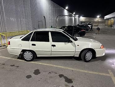 Daewoo Nexia: 2012 г., 1.5 л, Механика, Газ, Седан — 4
