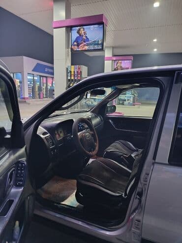 срочно продаю в связи с переездом: Ford Maverick: 2003 г., 2 л, Механика, Бензин, Кроссовер — 10