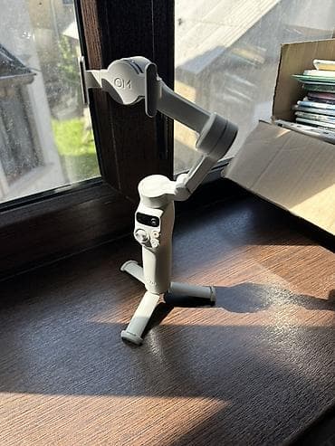 портативные блендеры: Стабилизатор для смартфона DJI OM (серия Osmo Mobile) с мини-штативом — 1